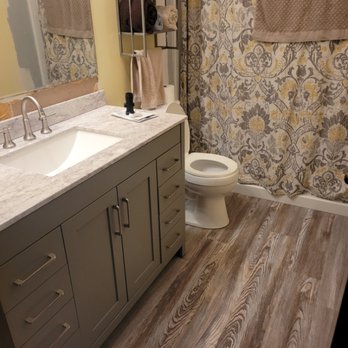 Harmon Construction and Remodeling - After. New flooring, New vanity and top - General Contractors Near Me