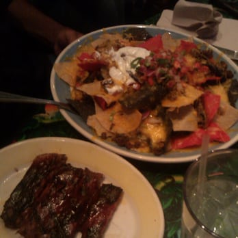 Rainforest Cafe - nachos with side ribs - American Near Me - Ontario, California Rainforest Cafe - nachos with side ribs - American Near Me - Ontario, California