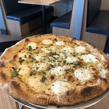 Zoli's Pizza - Round white pizza - Pizza Near Me - Fort Worth, Texas Zoli's Pizza - Round white pizza - Pizza Near Me - Fort Worth, Texas