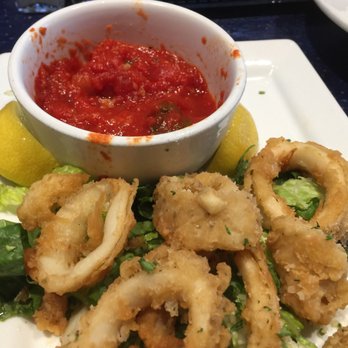 Papa Giuseppe - Half eaten calamari.. lol...yum .. couldn't wait.. - Desserts Near Me - Delray Beach, Florida