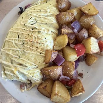 Genki Kitchen - Kikori omelet after I took a bite - Japanese Near Me - Sacramento, California Genki Kitchen - Kikori omelet after I took a bite - Japanese Near Me - Sacramento, California