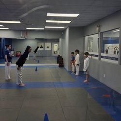 Students are learning respect with Sensei Areeg teacher guidance.