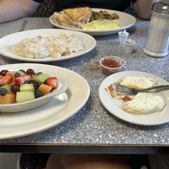 Rosie's Restaurant - Breakfast at Rosie's! Bacon omelet and side of biscuit and gravy. Fruit cup and Egg for me! - American Near Me - Tamworth, New Hampshire Rosie's Restaurant - Breakfast at Rosie's! Bacon omelet and side of biscuit and gravy. Fruit cup and Egg for me! - American Near Me - Tamworth, New Hampshire