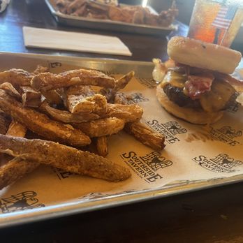 Southside Tavern - All American Burger served on a donut. Very yummy, but hard to fit in your mouth - Burgers Near Me - Goldthwaite, Texas Southside Tavern - All American Burger served on a donut. Very yummy, but hard to fit in your mouth - Burgers Near Me - Goldthwaite, Texas