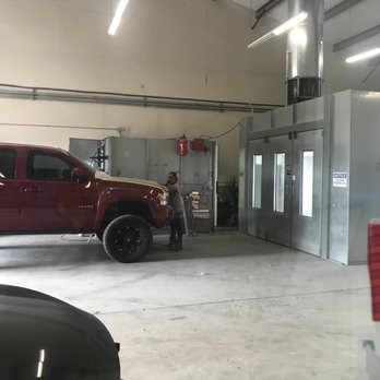 Master Match Collision Center - Inside their building watching a tech detailing. - Body Shops Near Me - San Antonio, Texas