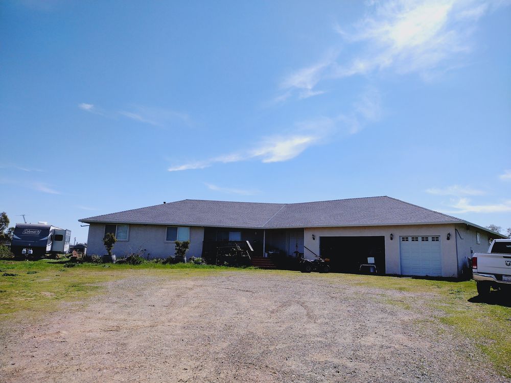 Slide of Tim Jones Roofing