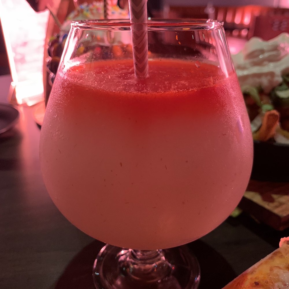 Haze Restaurant + Lounge - a drink with a straw in it - Hookah Bars Near Me - Richmond Hill, Ontario