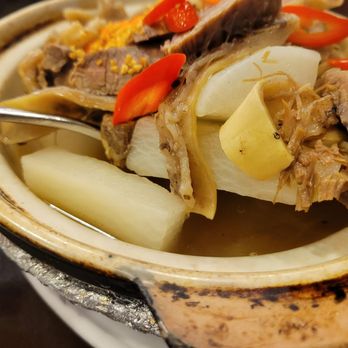 Keung Kee Congee - a bowl of soup with meat and vegetables - Chinese Near Me - Markham, Ontario