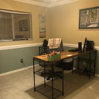Floor-Mart - a work area with a desk and a fan - Flooring Near Me - Cape Coral, Florida Floor-Mart - a work area with a desk and a fan - Flooring Near Me - Cape Coral, Florida