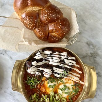 Motek - The Shakshuka was perfection! Totally hit the spot. Added roasted eggplant too. - Mediterranean Near Me - Aventura, Florida Motek - The Shakshuka was perfection! Totally hit the spot. Added roasted eggplant too. - Mediterranean Near Me - Aventura, Florida