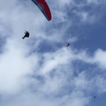 Diamond Head Beach Park - Hang gliders soaring above the beach park - Parks Near Me - Honolulu, Hawaii