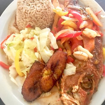 Irie Eats - Red snapper... The whole red snapper, blew my mind, but Red snapper, rice & peas and cabbage. - Caribbean Near Me - St. Louis, Missouri