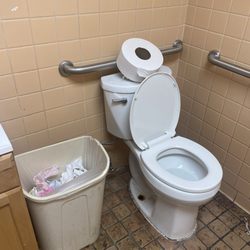 J & S Food Mart - Toilet paper was not in the dispenser. Was on the back of the toilet instead.