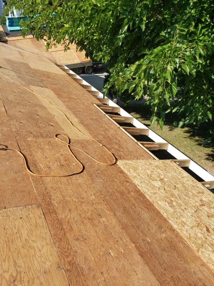 Slide of Brubaker's Roofing