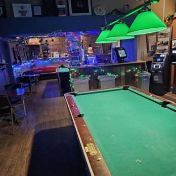 Community Inn Restaurant - One of the pool tables with green shade lamps above. - Dive Bars Near Me - Roanoke, Virginia