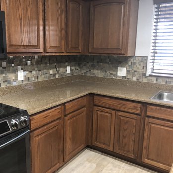 Modern Image Interiors - a kitchen with granite countertops - Flooring Near Me - Mesa, Arizona Modern Image Interiors - a kitchen with granite countertops - Flooring Near Me - Mesa, Arizona