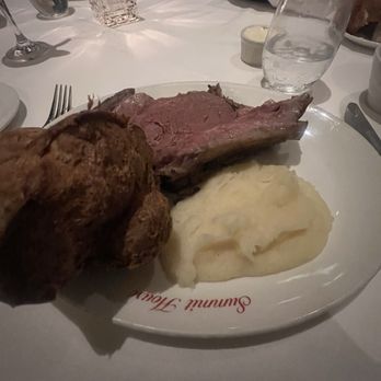 Summit House - Castle Cut Roast Prime Rib of Beef - Garlic Mashed Potatoes - Yorkshire Puff - Steakhouses Near Me - Fullerton, California Summit House - Castle Cut Roast Prime Rib of Beef - Garlic Mashed Potatoes - Yorkshire Puff - Steakhouses Near Me - Fullerton, California