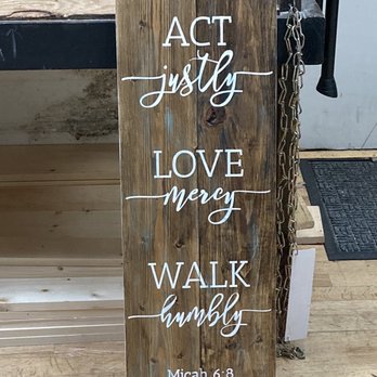 Board & Brush - One of many signs I have made at this location. - A vertical wooden sign features white painted text with Christian messages and a Bible verse, displayed indoors. - Paint & Sip Near Me - New Lenox, Illinois