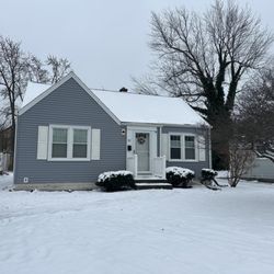 McCarthy Remodeling - We finally finished this house. It has blue vinyl siding and a white aluminum trim.