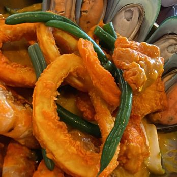 Hong Ning Restaurant - Seafood Kare Kare Literally fried frozen calamari, shrimp and fish nuggets. And thawed mussels in sauce no flavor.  The worst!!! - Filipino Near Me - Carol Stream, Illinois