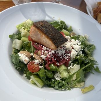 Maguire's Bay Front Restaurant - Mediterranean Salad with Grilled Salmon - Seafood Near Me - Ocean Beach, New York Maguire's Bay Front Restaurant - Mediterranean Salad with Grilled Salmon - Seafood Near Me - Ocean Beach, New York