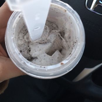McDonald's - a hand holding a cup of ice cream - Fast Food Near Me - Bakersfield, California