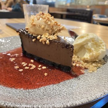 Earls Kitchen + Bar - Peanut butter + Chocolate Cheesecake - New American Near Me - McLean, Virginia Earls Kitchen + Bar - Peanut butter + Chocolate Cheesecake - New American Near Me - McLean, Virginia