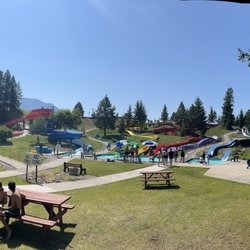 Big Sky Water Park - Panoramic of the various slides coming down the hill. Great walk says up to them makes it easy and only a few stairs on the big orange one.