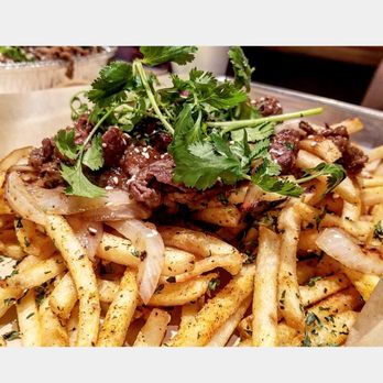 Nguyen's Kitchen - DELICIOUS CRISPY CAJUN FRIES W.JUICY SLICED BEEF - Vietnamese Near Me - Costa Mesa, California Nguyen's Kitchen - DELICIOUS CRISPY CAJUN FRIES W.JUICY SLICED BEEF - Vietnamese Near Me - Costa Mesa, California