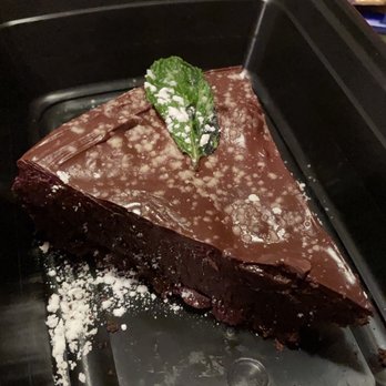 Le Paddock - chocolate cake with creme anglaise - French Near Me - Brooklyn, New York