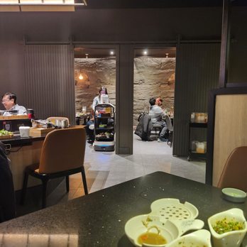 Ushi Shabu Shabu - Interior, robot server - Hot Pot Near Me - Richmond Hill, Ontario Ushi Shabu Shabu - Interior, robot server - Hot Pot Near Me - Richmond Hill, Ontario