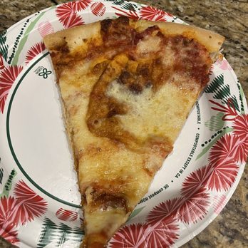 Giovanni's Pizzeria & Kitchen - Different slice than previous photo. Another giant dough bubble. - Italian Near Me - Oviedo, Florida Giovanni's Pizzeria & Kitchen - Different slice than previous photo. Another giant dough bubble. - Italian Near Me - Oviedo, Florida