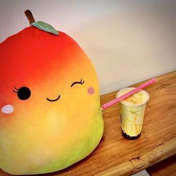 Island Time Boba Cafe - Mascot with Matcha Smoothie - Desserts Near Me - Kona, Hawaii Island Time Boba Cafe - Mascot with Matcha Smoothie - Desserts Near Me - Kona, Hawaii