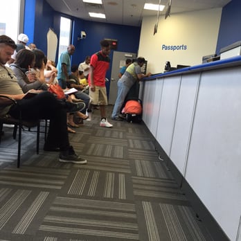 US Post Office - Small passport main room, ticket machine is close to wall next to that door. Get a ticket for each person applying. - Post Offices Near Me - Merrifield, Virginia
