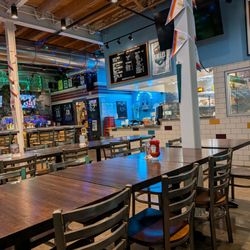 Brotherly Love Cheesesteaks - Sitting area and cashier counter