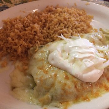 Servando's - 3 corn tortillas filled with chicken enchiladas dinner topped with green salsa, melted cheese, sour cream, & onions - Mexican Near Me - Winter Garden, Florida Servando's - 3 corn tortillas filled with chicken enchiladas dinner topped with green salsa, melted cheese, sour cream, & onions - Mexican Near Me - Winter Garden, Florida