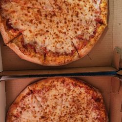 Vocelli Pizza - Two cheese pizzas look delicious