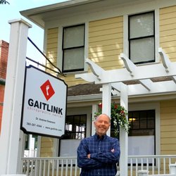 Gaitlink Chiropractic Center - Dr. Swanson in front of Gaitlink Chiropractic Center in Port Gamble.