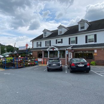 Baugher's Restaurant - two cars parked in a parking lot - American Near Me - Westminster, Maryland