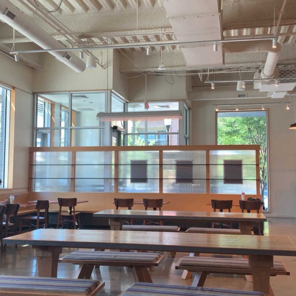 Strang Hall - Some seating, looking forward to the entrance by the street - Food Court Near Me - Overland Park, Kansas