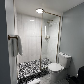 Kimpton Alton Hotel - Open shower. Design was interesting but some water came out onto the floor. - Hotels Near Me - San Francisco, California