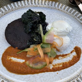 Ponto Lago - Poached eggs with a blue corn papusa. - New American Near Me - Carlsbad, California