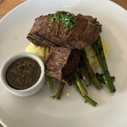 Plant-based steak with chimichurri, mashed potatoes and broccolini