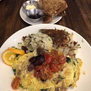 Plums Cafe - Spinach and feta omelette - minus the feta cheese and I also added red onions. - Breakfast & Brunch Near Me - Costa Mesa, California