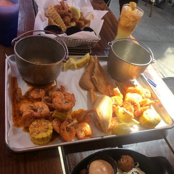 Bubba Gump Shrimp - Cajun/Lemon butter Shrimp Boil+Coconut/Tempura/ Fried Shrimp+Fries+Hush Puppies  Watermelon MargJennys Fav Spiked Iced Tea - Seafood Near Me - Long Beach, California