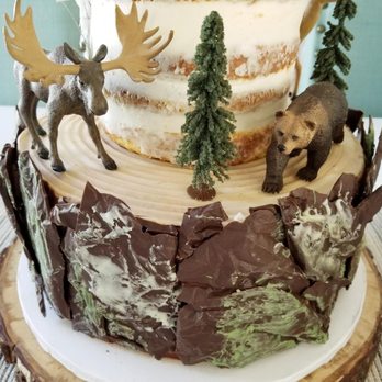 Harvard Sweet Boutique - The moss covered chocolate bark, the rings on the tree where the animals are standing, amazing attention to detail throughout! - Bakeries Near Me - Hudson, Massachusetts
