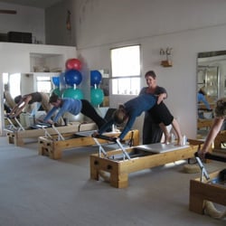 Pilates Palm Springs - Susan hard at work leading a semi-private class