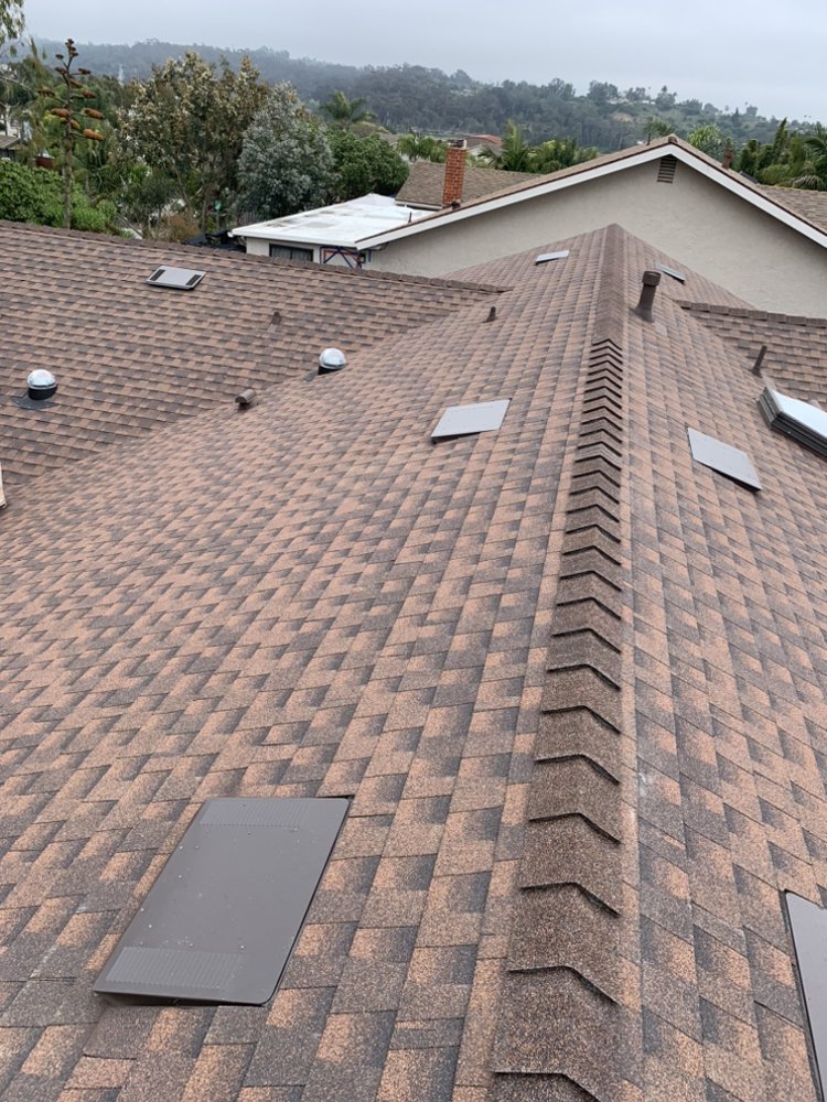 Slide of Aqua MG Roofing and Painting