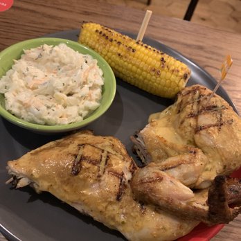 Nando's - Half chicken with Cole slaw and corn sides - Chicken Shop Near Me - Kensington, XGL