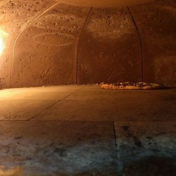 Pizza Garden Main - Massive Mugnaini Pizza Oven and an 18" pizza in it. - Pizza Near Me - Vancouver, British Columbia Pizza Garden Main - Massive Mugnaini Pizza Oven and an 18" pizza in it. - Pizza Near Me - Vancouver, British Columbia